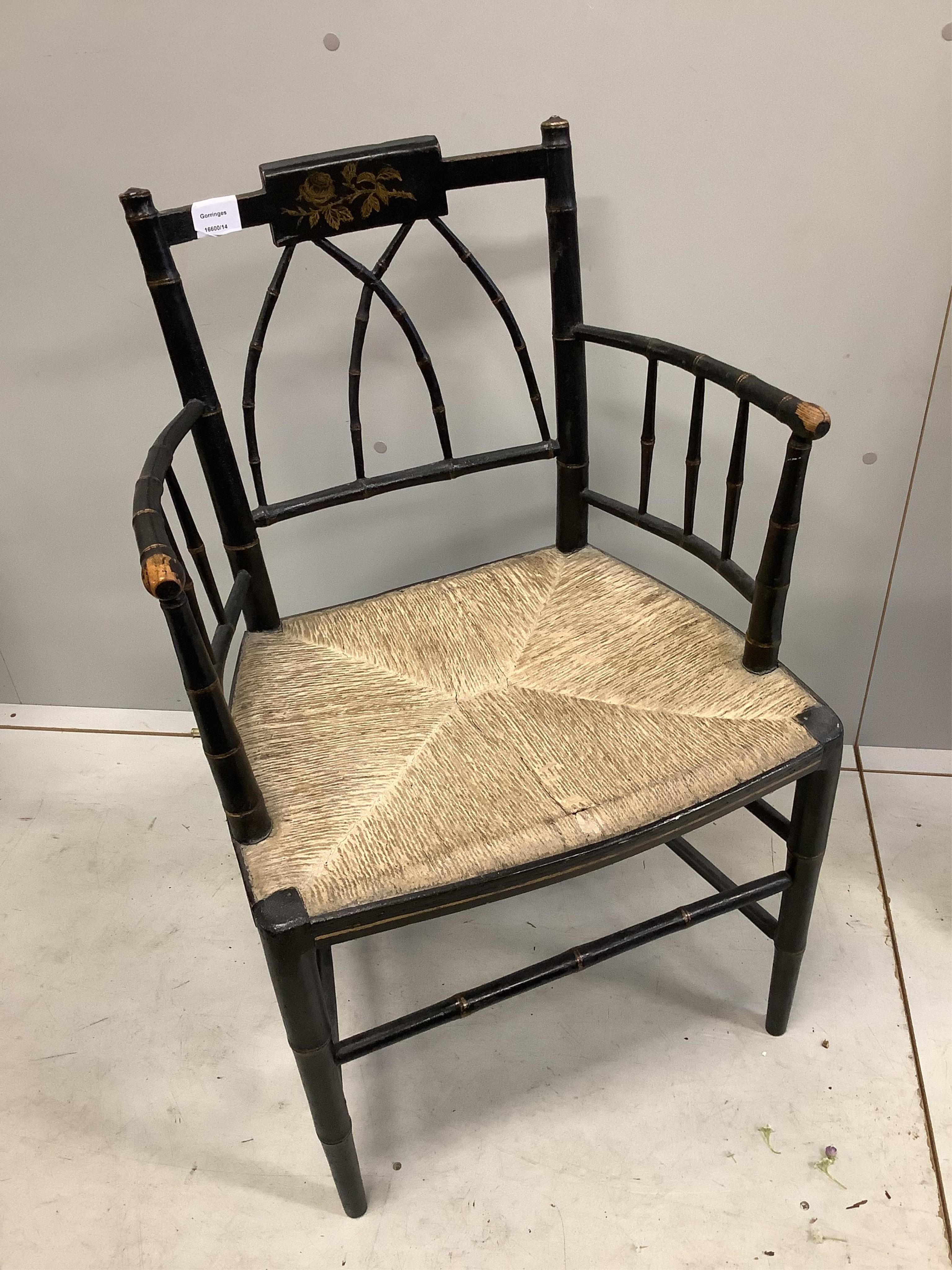 A Regency painted faux bamboo elbow chair, width 52cm, depth 41cm, height 85cm. Condition - fair